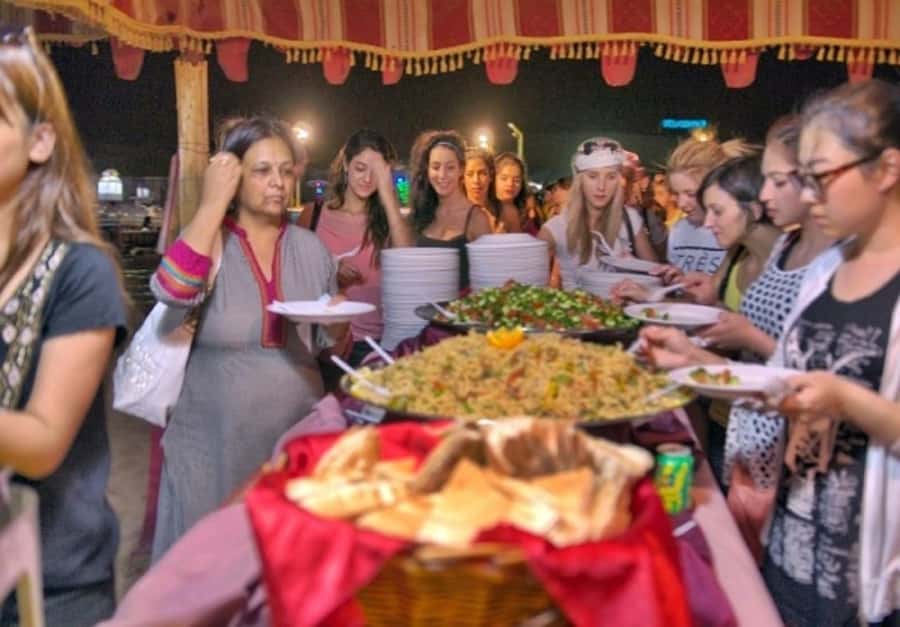 Dubai: Desert Safari Camel Riding, Sandboarding & BBQ Dinner - Arrival at the evening desert camp