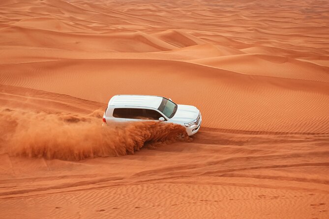 Dubai Desert Safari, Dune Bashing, Camel Ride, Sandboarding & BBQ - Leaving Dubai for the Lahbab desert