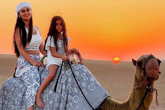 Dubai Desert Safari: Dune Drive Camel & 5<em> BBQ Shows Stargazing – Key points to know before booking’ /></p>
<ul>
<li><strong>Lahbab’s red dunes provide the main rush:</strong> The 15-minute dune-bashing section is the central adventure, with a photo stop afterward.</li>
<li><strong>Pickup is shared but limited:</strong> A Land Cruiser collects you from your home or hotel, with up to six people in the vehicle.</li>
<li><strong>The camp packs in classic desert activities:</strong> You can ride a camel, try sandboarding, receive henna, and pose in Arabic clothing.</li>
<li><strong>Dinner comes with three live shows:</strong> The evening program includes belly dancing, Tanoura dancing, and a fire performance.</li>
<li><strong>Paid upgrades can change the evening:</strong> ATV riding, dune buggies, longer camel rides, falcon photos, and private transport are not included.</li>
<li><strong>The $49 price covers a lot:</strong> Water, tea, coffee, soft drinks, dinner, transport, activities, and entertainment are all part of the basic package.</li>
</ul>
<h2 id="from-dubai-hotels-to-lahbabs-red-dunes">From Dubai hotels to Lahbab’s red dunes</h2>
<p><img width="669" height="446" decoding="async" src=