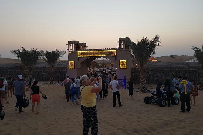 Dubai Desert Safari evening with VIP Treat , BBQ Buffet and Exciting Liveshows - Camel Riding and Sandboarding