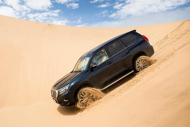 Dubai Desert Safari Offer - Camel Riding and Arabian Dress Photos