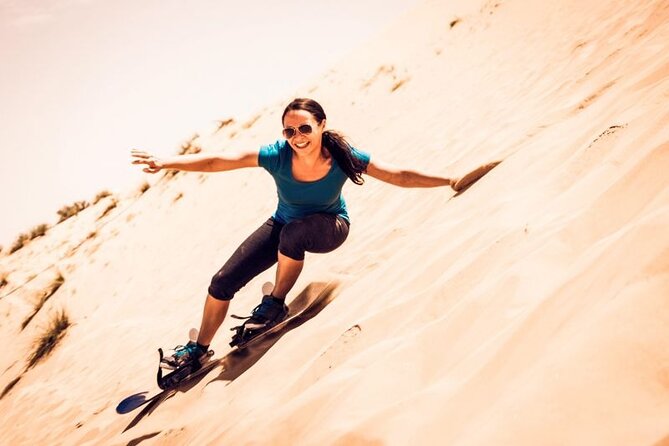 Dubai Desert Safari: Quad Bike, Camel Ride and BBQ Dinner - Dune bashing in a 4x4
