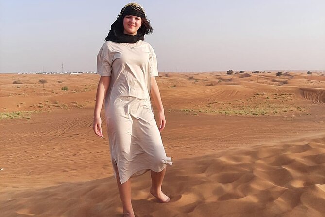 Dubai Desert Safari: Quad Bike, Camel Ride and BBQ Dinner - Quad biking at sunset in the Lehbab desert