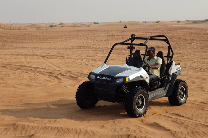 Dubai Desert Safari, Quad Bike, Camel Ride, and Buffet Dinner - Dune bashing and sandboarding at Lahbab
