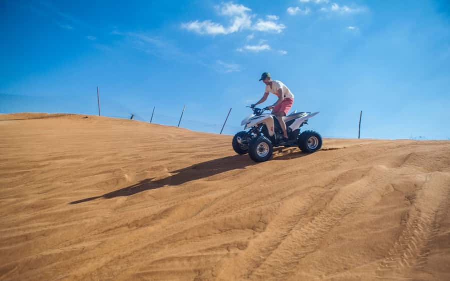Dubai: Desert Safari, Quad Bike, Camel Ride and Sandboarding - Sandboarding and the climb back up