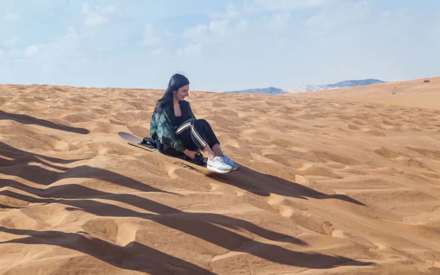 Dubai: Desert Safari, Quad Bike, Camel Ride and Sandboarding - Guides, communication, and the human side
