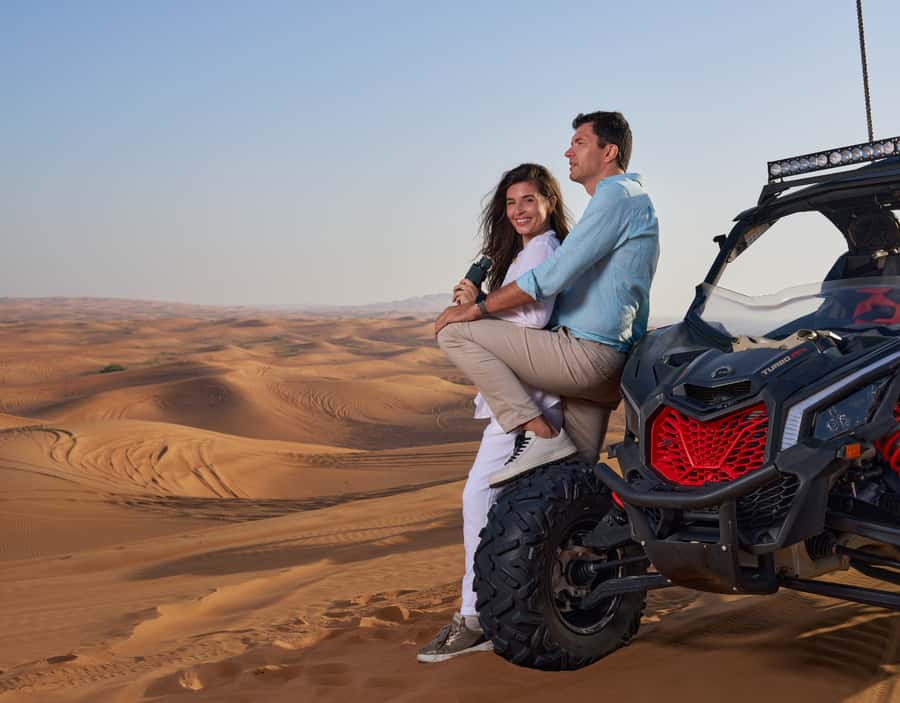 Dubai: Desert Safari, Quad Bike & Premium Camp Experience - From Dubai hotel pickup to the open desert