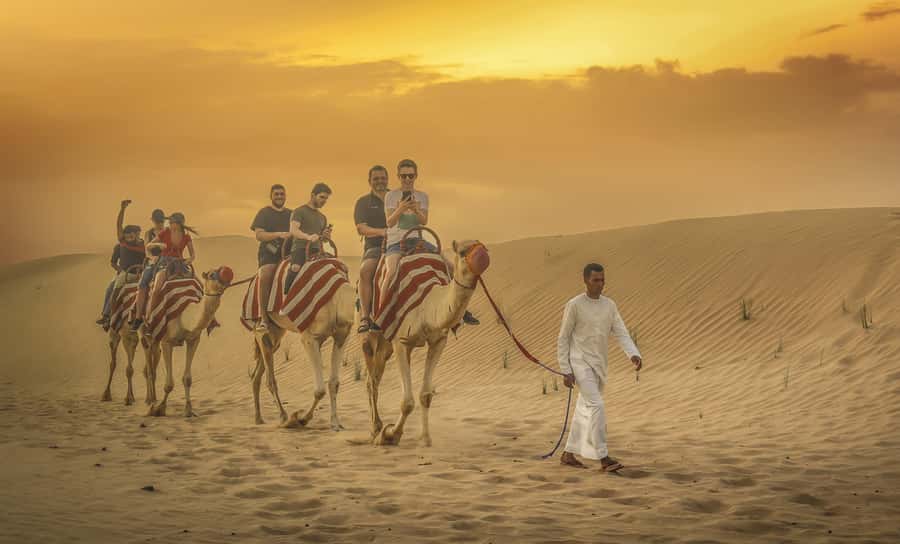 Dubai: Desert Safari, Quad Bike, Sandboarding, Camels & BBQ - The best parts of this desert safari