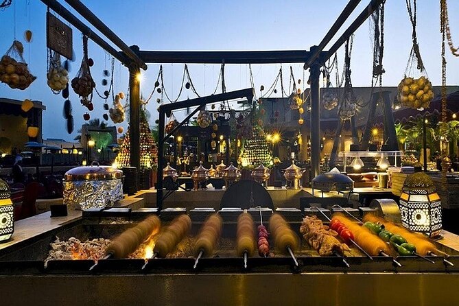 Dubai Desert Safari Red Dune: BBQ, Camel Ride & Sandboarding - Henna, Arabic dress, and the camp setting