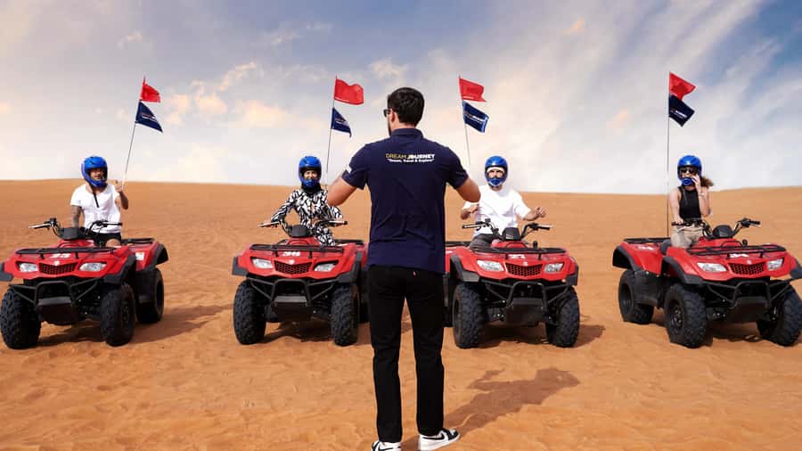 Dubai Desert Safari - Sandboarding, Quad Bike & BBQ Options - BBQ dinner, Tanura, belly dance, and fire shows