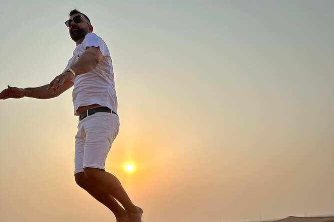 Dubai Desert Safari Thrilling Adventure Unforgettable Experiences - What the guides add to the experience