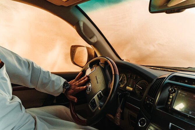 Dubai Desert safari Tour with Live BBQ & Belly Dance Shows - Al Aweer brings the camel ride and camp setting
