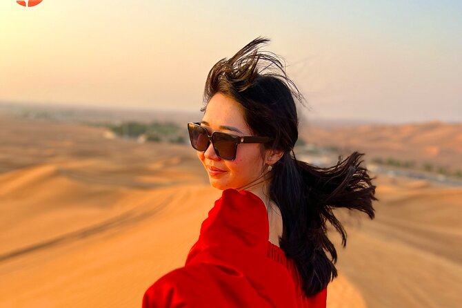 Dubai desert safari with 4x4 Dune Bashing,Camel Ride sand board - Dinner, refreshments, and a full evening of shows