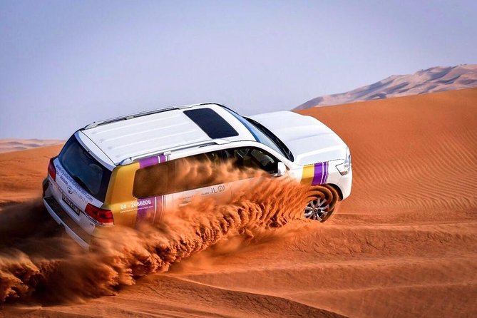 Dubai Desert Safari with BBQ And 4W Land Cruiser Dune Bashing Experience - Key Details Before You Book