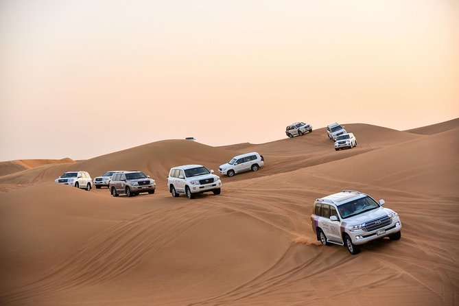 Dubai Desert Safari with BBQ And 4W Land Cruiser Dune Bashing Experience - Leaving Dubai for the Open Sand