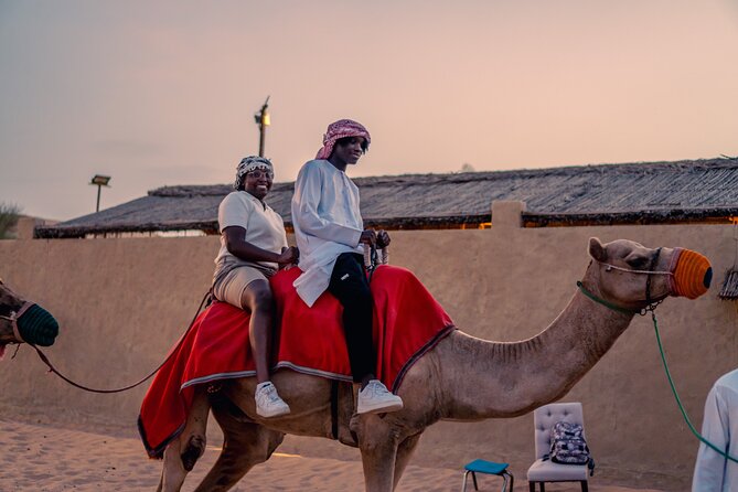 Dubai Desert Safari with BBQ, Dune, Live Shows - Sandboarding for an easy desert thrill