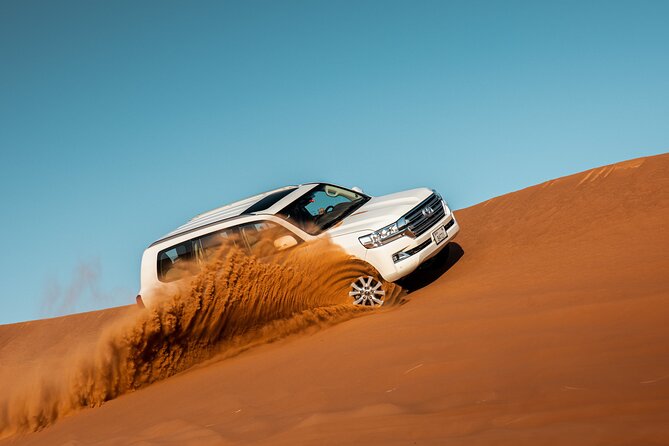 Dubai Desert Safari with Belly Dance, Fire Show and Tanura Show-The Full Package - Three Shows After Dark