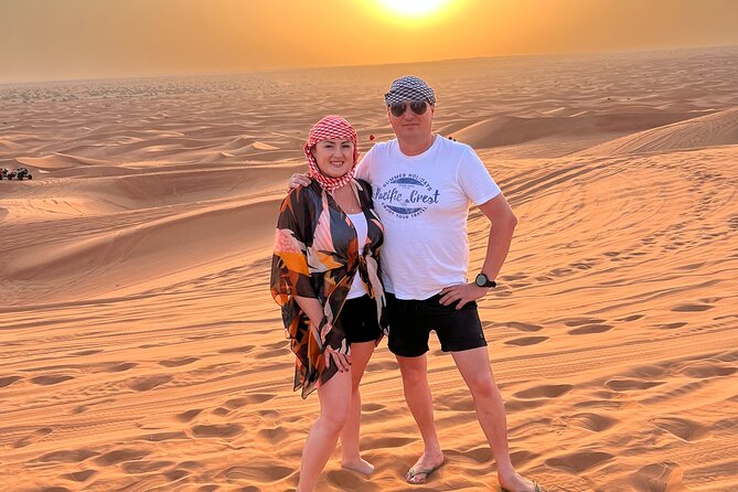 Dubai Desert Safari with Camel Ride, Sand surf, & BBQ Dinner - Dinner and Live Performances After Dark