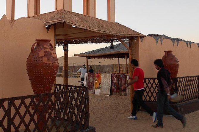 Dubai Desert Safari with Camel Ride, Show, BBQ and Transfers - Sunset photographs and camp arrival