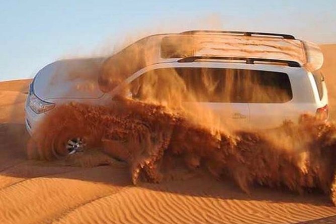Dubai Desert Safari with Camel Riding, Sand Boarding,BBQ Dinner and 3 Live Shows - Pickup, the Land Cruiser, and the long road to Al Awir