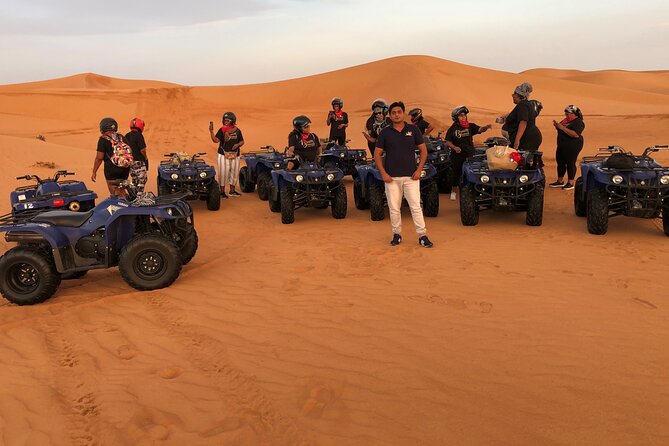 Dubai Desert Safari With Camp Activities and ATV Self Drive Quad Bike - Camel riding and sand boarding at the desert stop