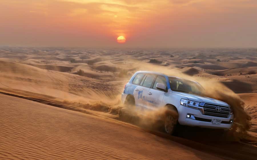Dubai: Desert Safari with Camp, Dinner, & Optional Overnight - Hotel pickup from Dubai, Sharjah, and Ajman