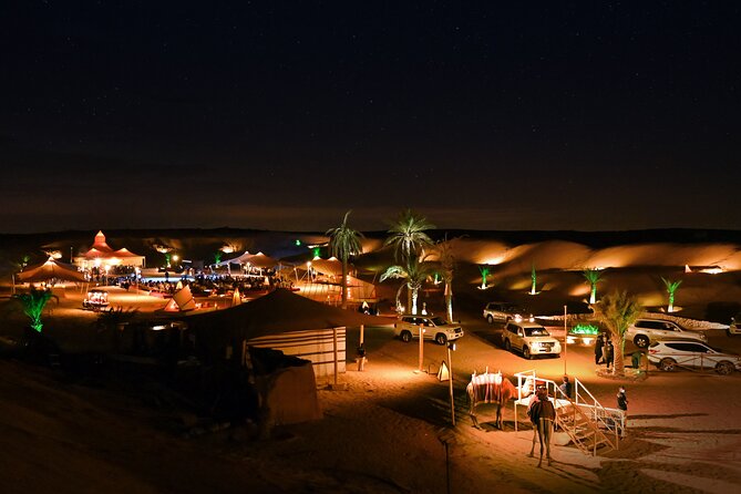 Dubai Desert Safari with Desert Camp Dinner, Camel Ride & Shows - Belly dancing, tanoura, and the fire show