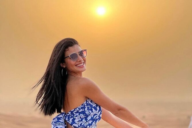 Dubai Desert Safari With Dinner And Live Shows - Red-dune dune bashing in a Land Cruiser