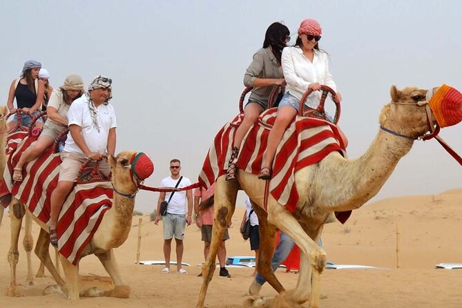Dubai Desert Safari with Dinner, Camel Ride & Dune Bashing - Arriving at the camp with Arabic tea and sweets