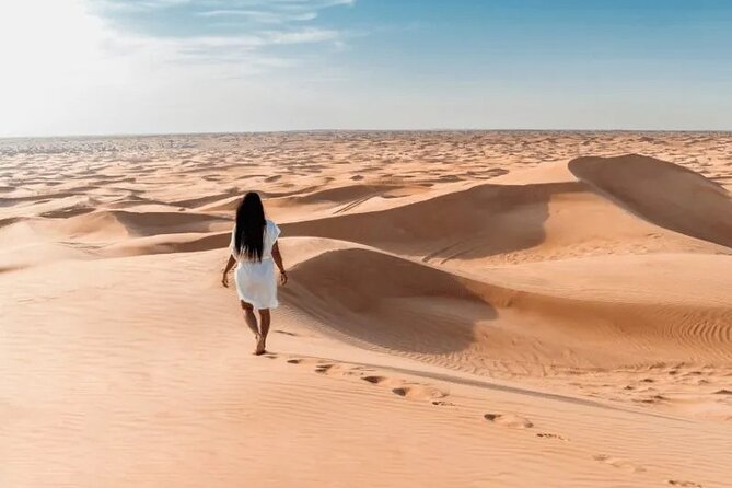 Dubai Desert Safari with Dinner - Sunset, Sandboarding, and the Camel Stop