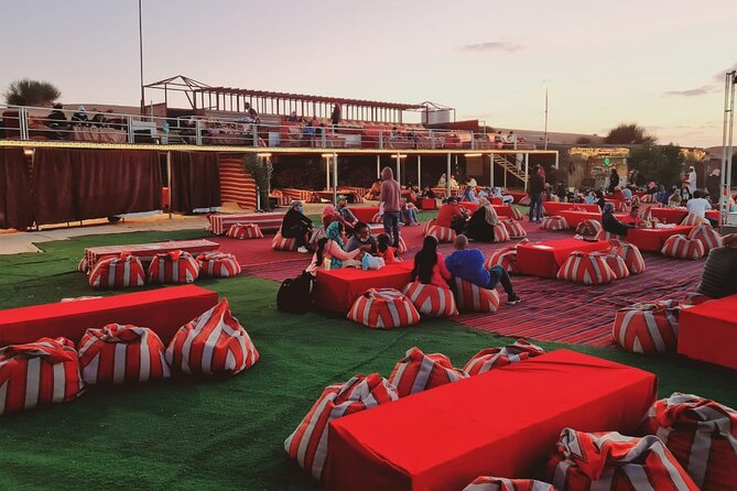 Dubai Desert Safari with Quad Bike, Camel Ride, Dinner and Show - Camel ride and sandboarding keep things slower