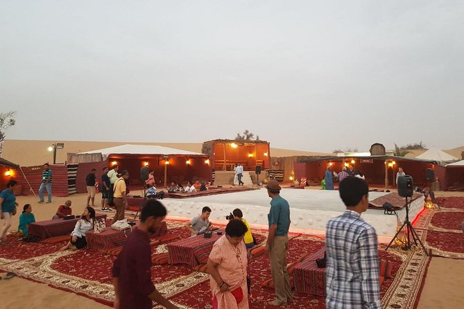 Dubai Desert Safari with Quad Bike, sandboarding, live show & BBQ - Guide service can shape the whole day