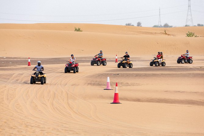 Dubai Desert Safari with Quads, BBQ Dinner, Camel ride, & Shows - Belly dancing and tanoura performances