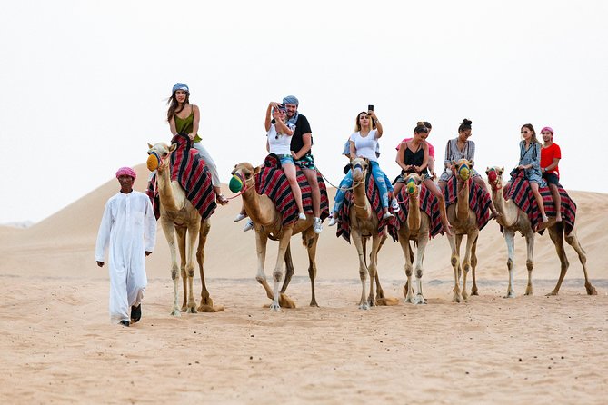 Dubai Desert Safari with Quads, BBQ Dinner, Camel ride, & Shows - Arabic coffee, dates, and the Bedouin-style camp