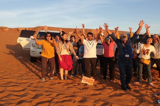 Dubai Desert Safari With Sandboarding & Camel Riding - The desert camp after sunset