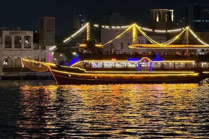 Dubai Dhow Cruise Dinner Al Seef Creek Multicusine - Boarding a traditional dhow for dinner