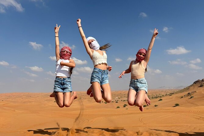 Dubai: Dune Buggy Safari and Camel Ride with Transportation - Sandboarding on the biggest slopes