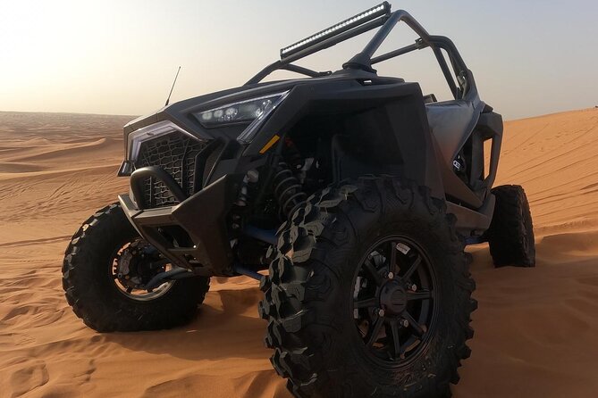 Dubai Dune Buggy Safari with Pick up - Dune bashing, camel riding, and sandboarding