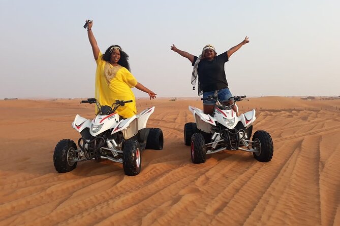 Dubai Dunes Safari With Quad Bike, Camel Ride, BBQ Dinner & Live Shows - Sandboarding and sunset photographs