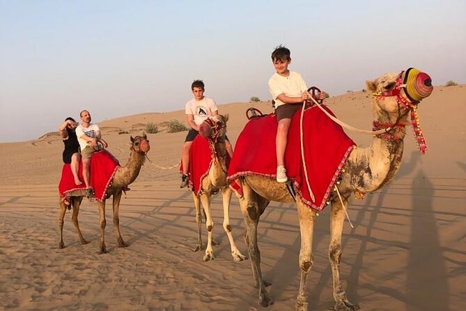 Dubai Evening Desert Safari - Camel ride, henna, and camp activities