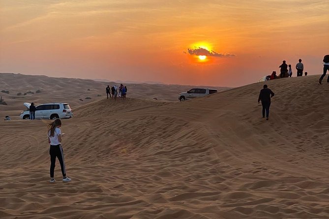 Dubai Evening Desert Safari with ATV Quad Bike & Dinner - Camel riding and the first taste of camp life