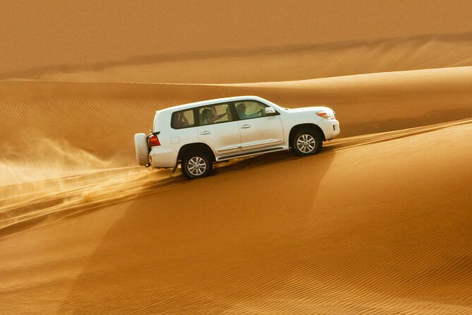 Dubai Evening4x4Desert Safari BBQ Dinner,4 Live Shows,Camel Ride - Dune bashing before sunset