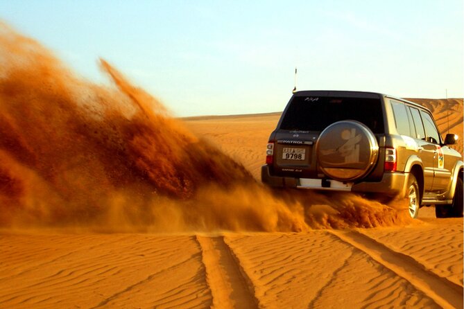 Dubai Evening4x4Desert Safari BBQ Dinner,4 Live Shows,Camel Ride - The sunset stop and desert photographs