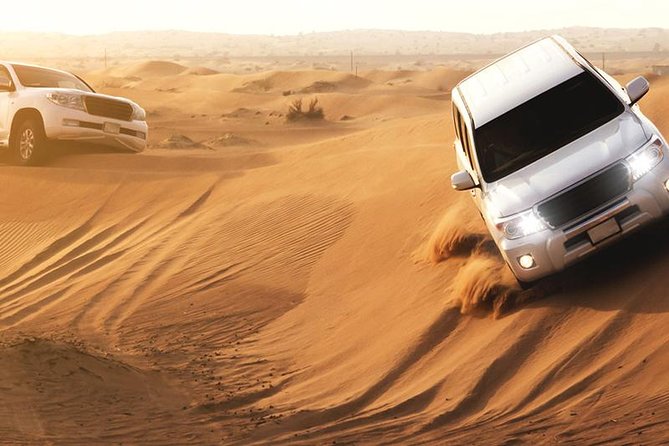Dubai Evening4x4Desert Safari,BBQ Dinner,4 LiveShows,Camelride - Hotel pickup and the ride into the dunes