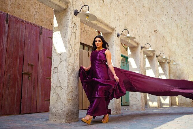 Dubai: Flying Dress with Photography and Exciting Dune Activities - Sandboarding and the included camel photo