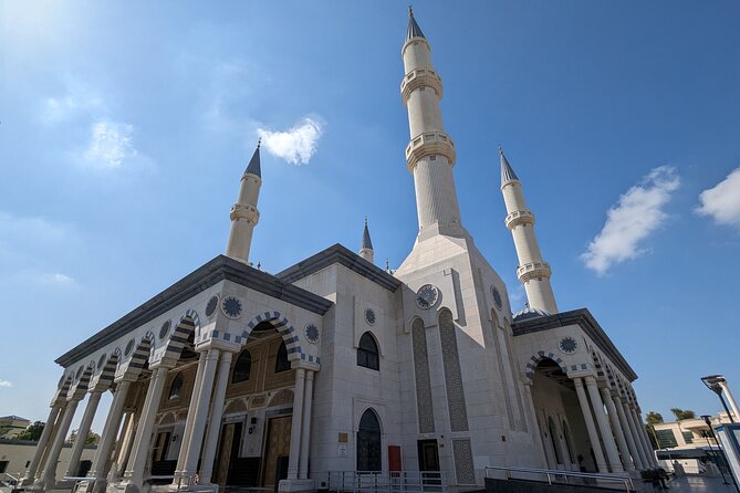 Dubai: Frame Tickets, Creek, Souks & Blue Mosque Guided Tour - Dubai Creek and the Abra ride