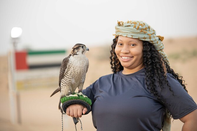 Dubai Half-day Red Dunes bashing with Sandboarding, Camel &Falcon - A short camel ride with a traditional feel