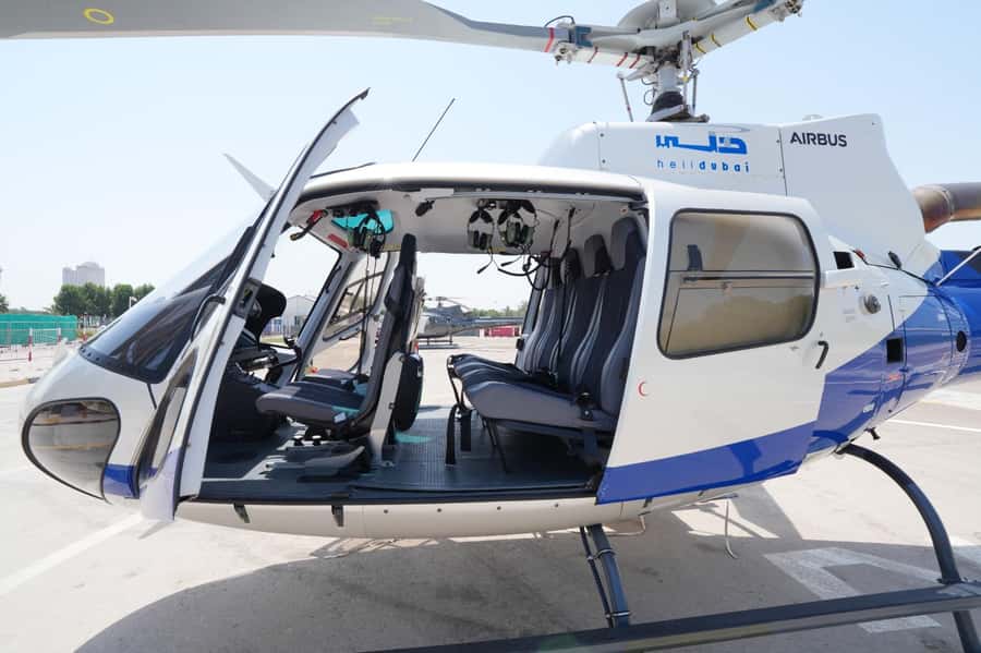 Dubai: Helicopter Ride, Old Town Walking Tour, Abra & Snacks - Walking Through Al Fahidi’s Narrow Lanes