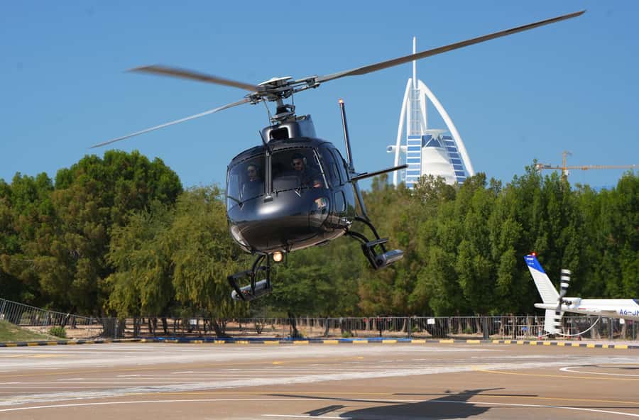Dubai: Helicopter Ride, Old Town Walking Tour, Abra & Snacks - Guides And Small-Group Comfort