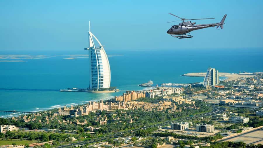 Dubai: Helicopter Ride, Old Town Walking Tour, Abra & Snacks - The Helicopter View Of Dubai In 12 Minutes